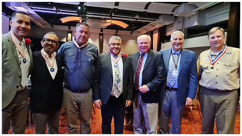 Four volunteers receive 2023 Silver World Award for international service to Scouting